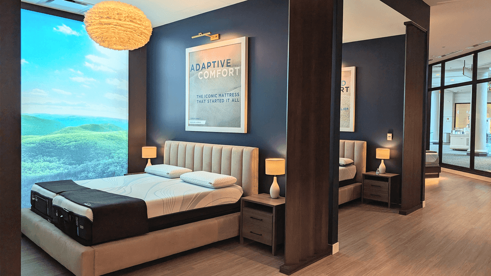 Tempur-Pedic Retail Showroom SLeep Pods, one pod has a scenic image of mountains next to it