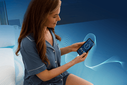 Woman looking at Sleeptracker app on phone