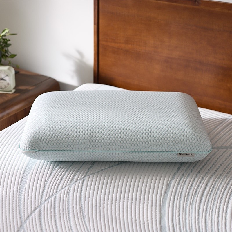 Tempur-Pedic Comfort Pillow on an Undressed Bed