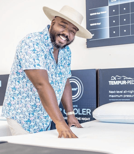 Kelvin Davis Image showing man standing next to LuxeBreeze Mattress