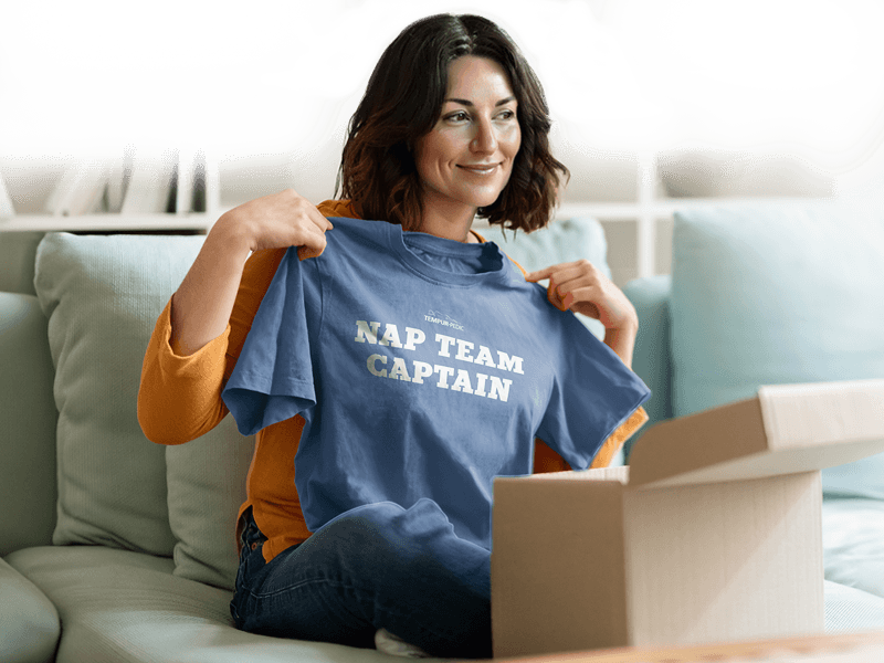 Woman holding a t-shirt