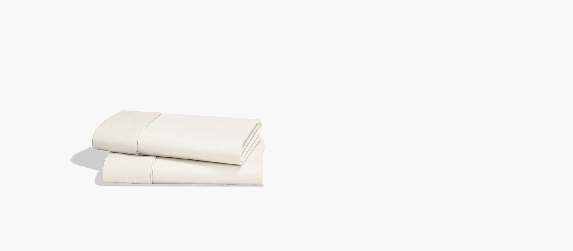 A pair of Premium Cotton Ecru Pillow Cases