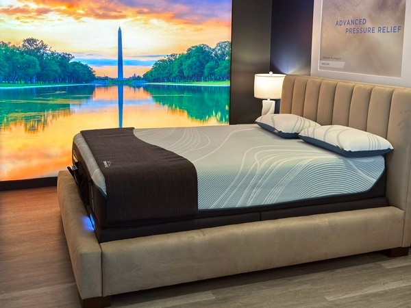 A Tempur-Pedic Retail Showroom Sleep Pod with an Image of the Washington Monument in the Background