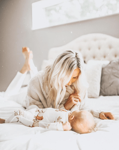Mom and Baby Laying on ProAdapt Mattress