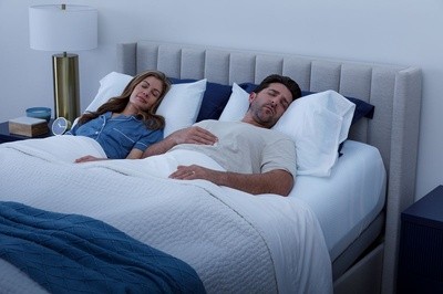 Couple Sleeping In Bed in Dark Room