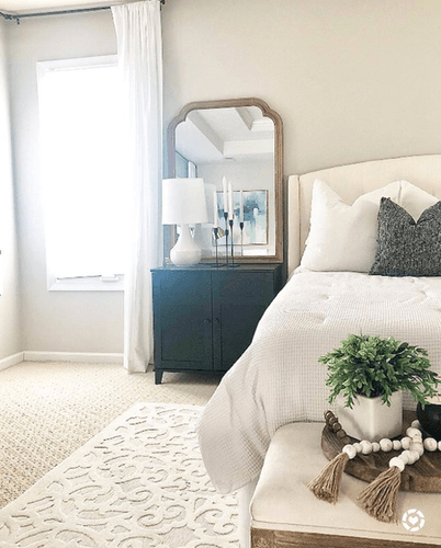 photo of styled bedroom and nightstand