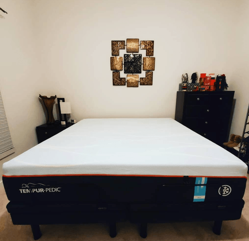 photo of mattress without any bedding